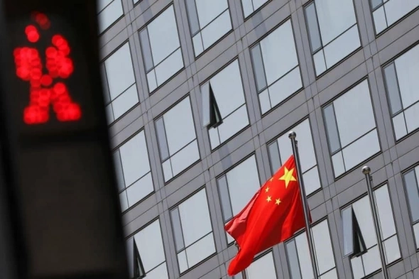 Китай хочет ограничить доступ к американским биржам своим компаниям