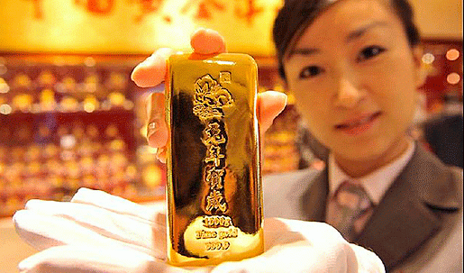 КИТАЙ массово изготавливает килограммовые слитки золота